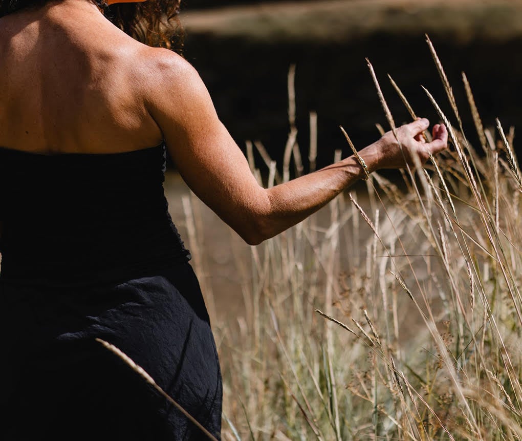 Kathryn Aalto walking through meadow