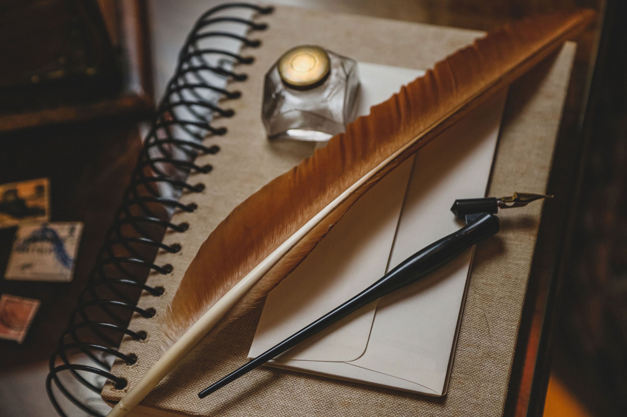 KAP-99 a pen, a notebook, at a desk for a writer